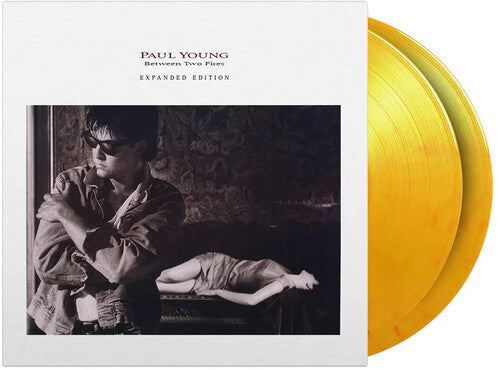 Paul Young: Between Two Fires - Limited & Expanded 180-Gram Flame Colored Vinyl - VINYL